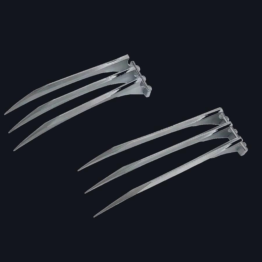 Both ClawX pairs laid flat, showing the hinged knuckle grip